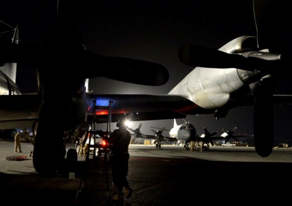 Local Input~ Canadian Armed Forces flight crew service the CP-140M Aurora Long Range Patrol aircraft as they arrive in Kuwait in support of Operation IMPACT on October 29, 2014.   Photo: Canadian Forces Combat Camera, DND IS2014-5784 ORG XMIT: IS2014-5785